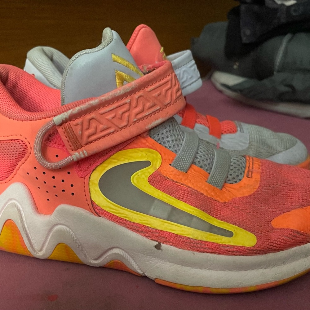 Nike Pink and Orange Sneakers with Dynamic Design